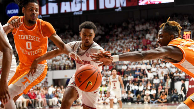 Mar 2, 2024; Tuscaloosa, Alabama, USA; Tennessee forward Jonas Aiddo (0), Alabama guard Rylan Griffen (3) and Tennessee guard Jahmai Mashack (15) go for a loose ball at Coleman Coliseum. Mandatory Credit: Gary Cosby Jr.-USA TODAY Sports
